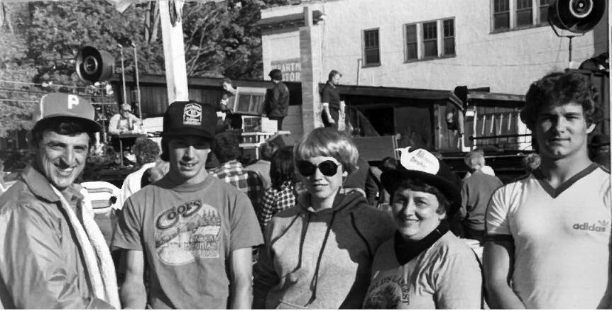 Volunteers and organizers posing together at the World&rsquo;s Largest Garage Sale.